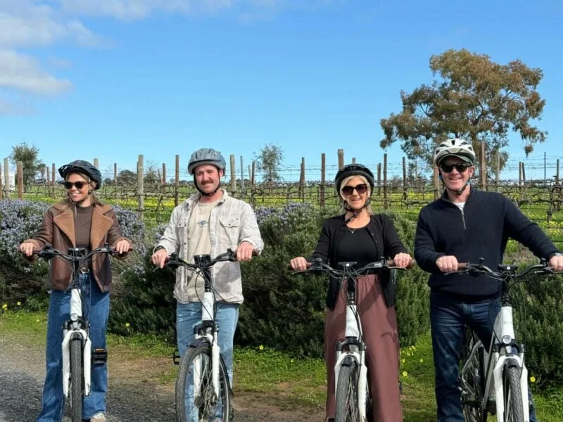 Four riders on their eBikes at McLaren Vale Visitor Centre