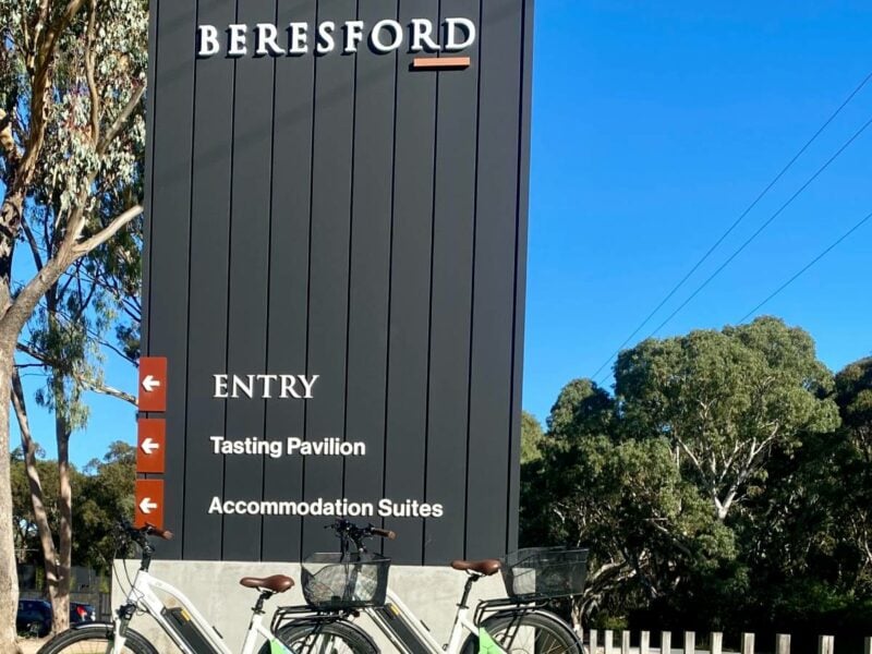 SA eBikes standing beside the Beresford sign