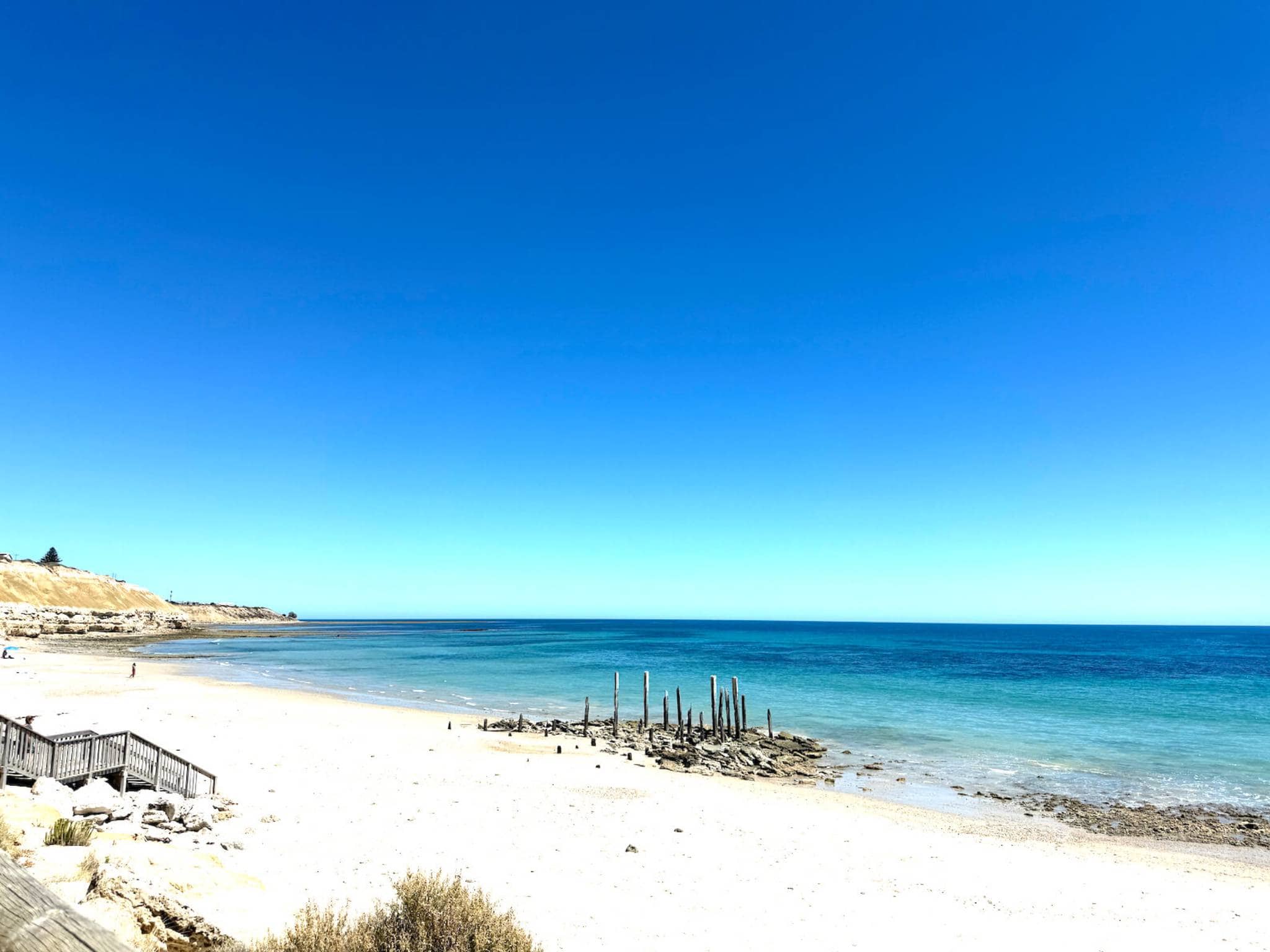 The stunning white sands and old jetty pylons at Port Willunga Beach
