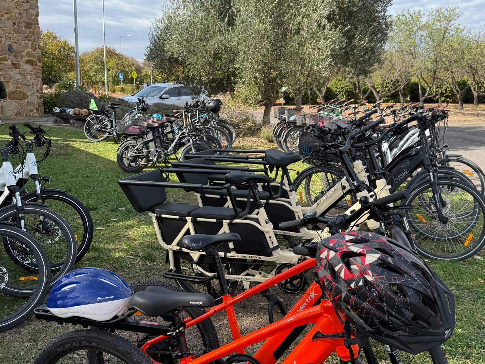 A range of different SA eBikes on the lawns of McLaren Vale Visitor Centre
