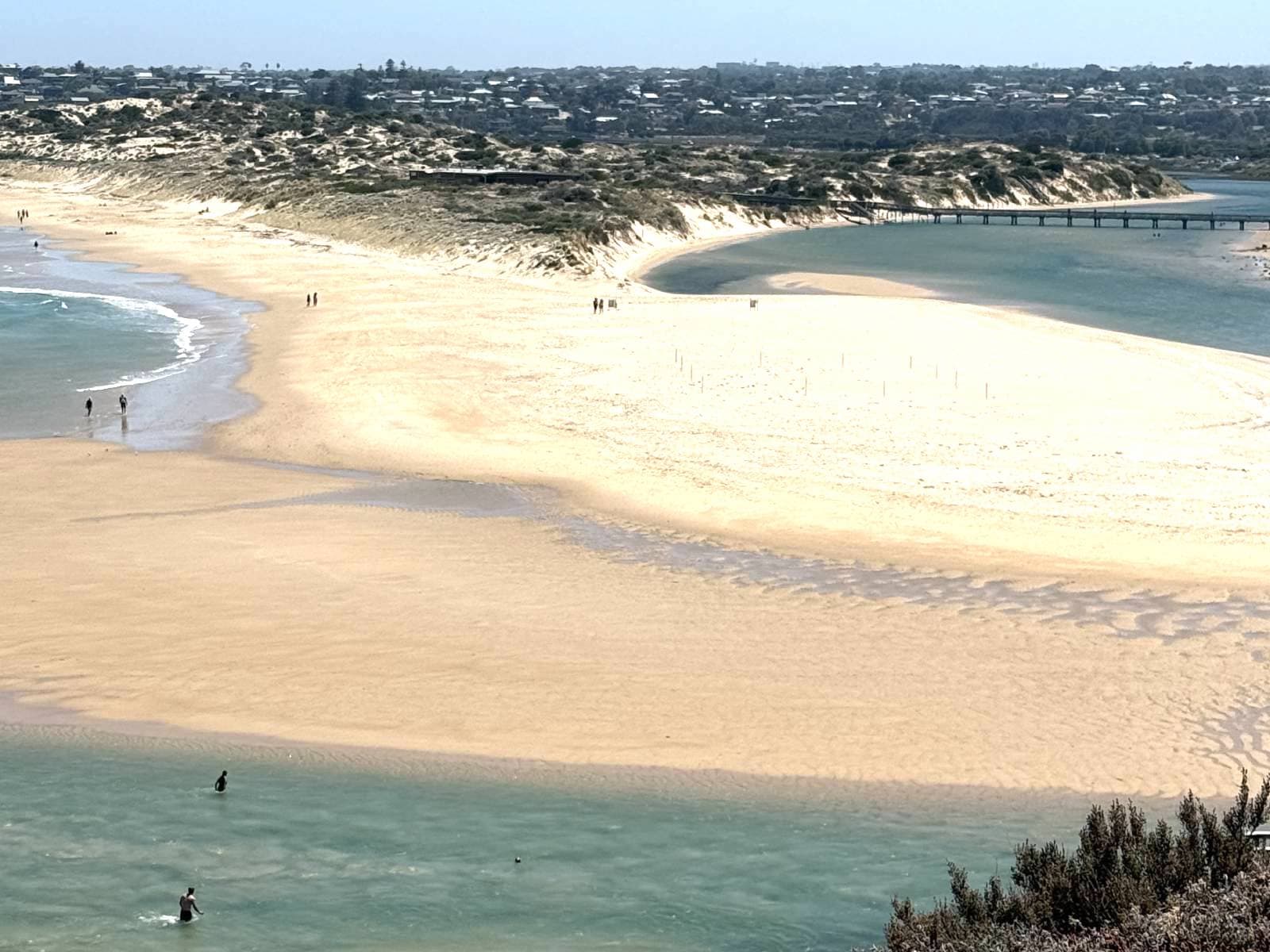 Sandy spit between the sea and the Onkaparinga River mouth