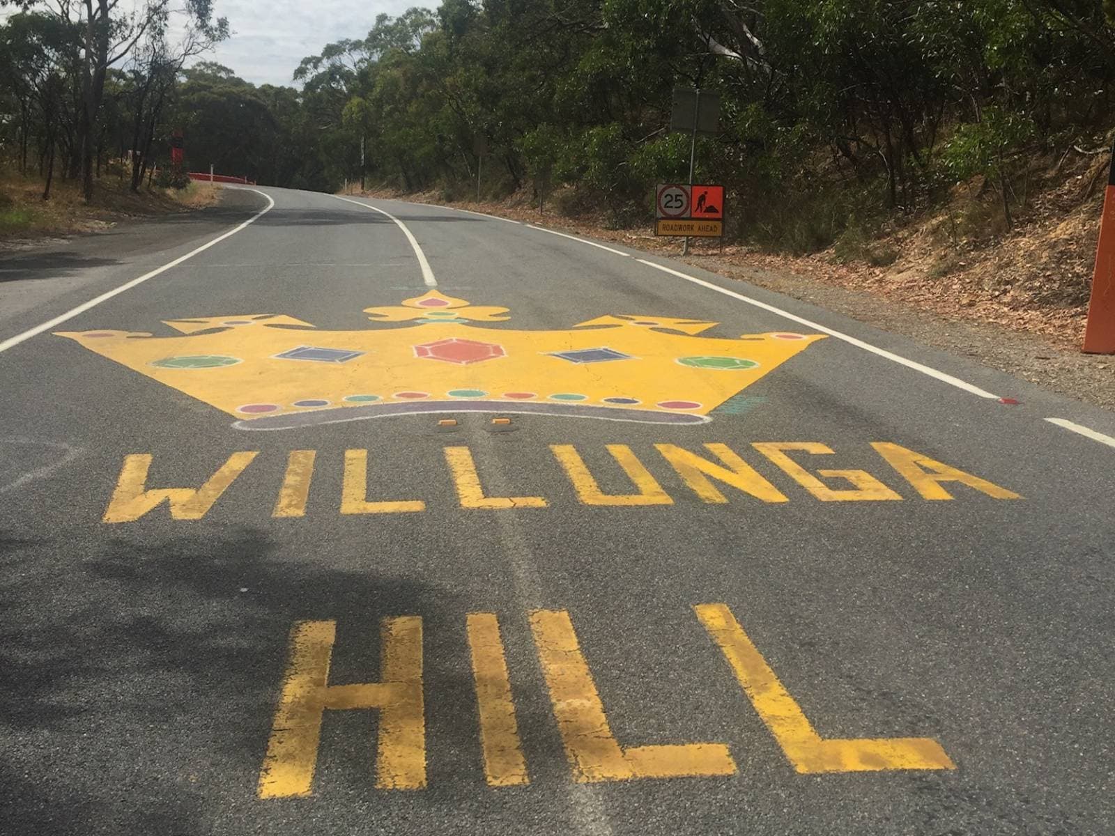King of the Mountain crown painted on the road at the top of Willunga Hill for the TDU