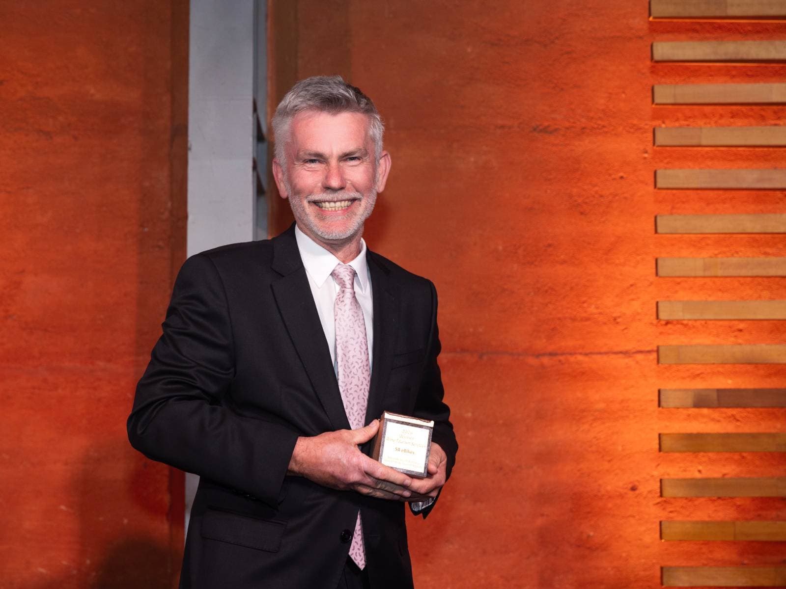 Shayne, owner SA eBikes, accepting award