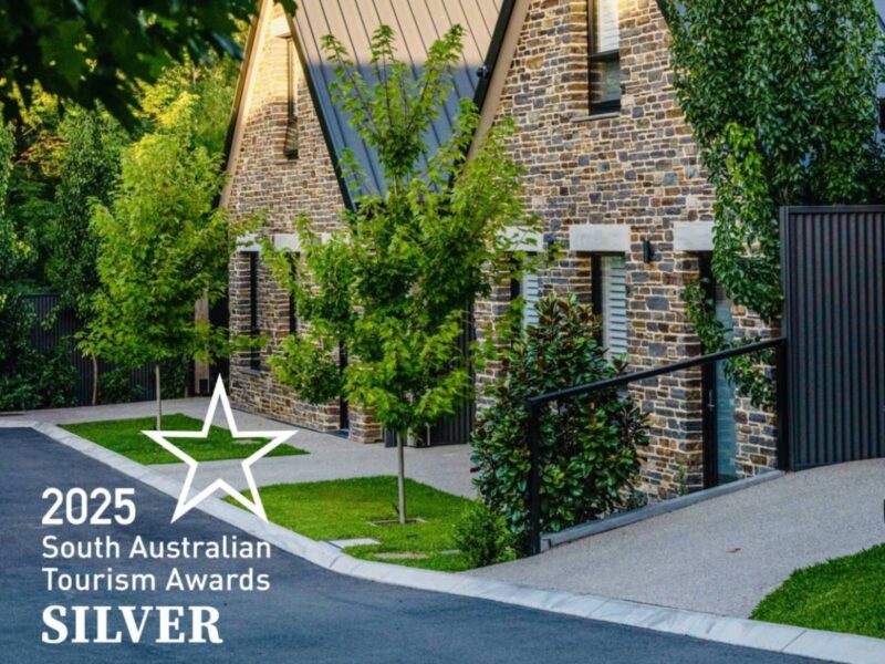 Vale 194's stone apartments covered in vines with logo of SA toursim awards silver medalist